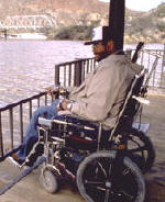 photo of man in wheelchair
fishing