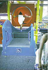 Photo of a transfer system at the entry of a soft contained play structure