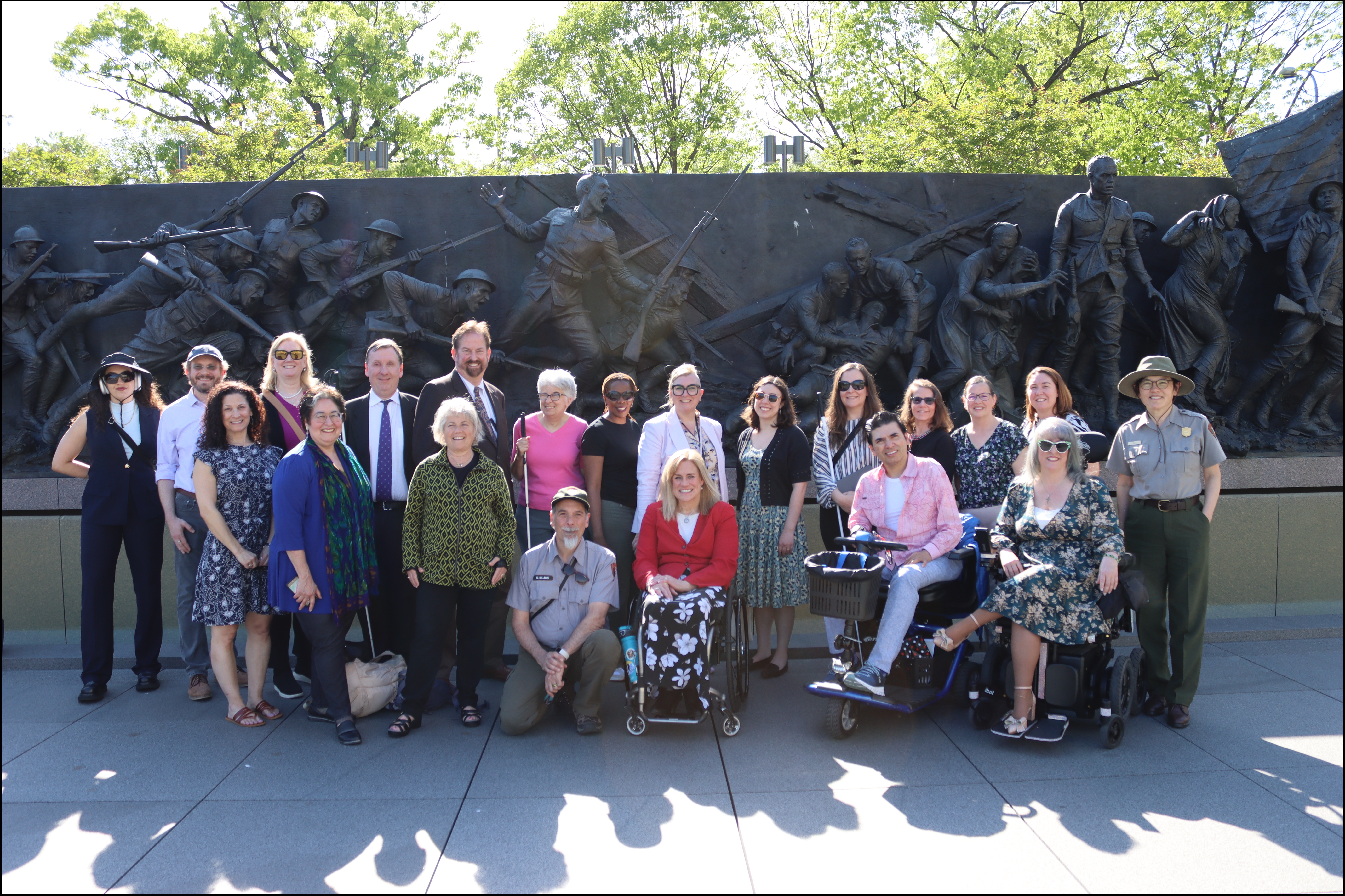 Access Board Members and staff stand in front of the WWI Memorial.